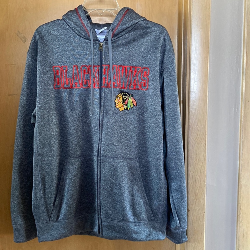 Men’s Gray Blackhawks zip up hoodie size medium. Great condition, barely worn.